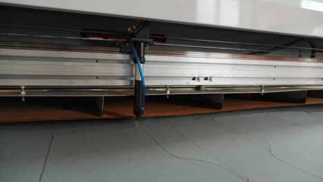 cnc machine for cutting fabrics textile materials and leather, laser marking and measurement. modern footwear production.