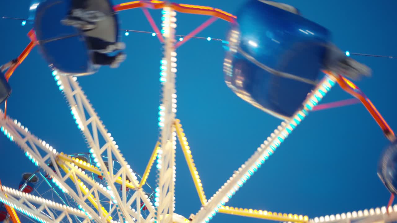 Spinning Ferris Wheel at Night