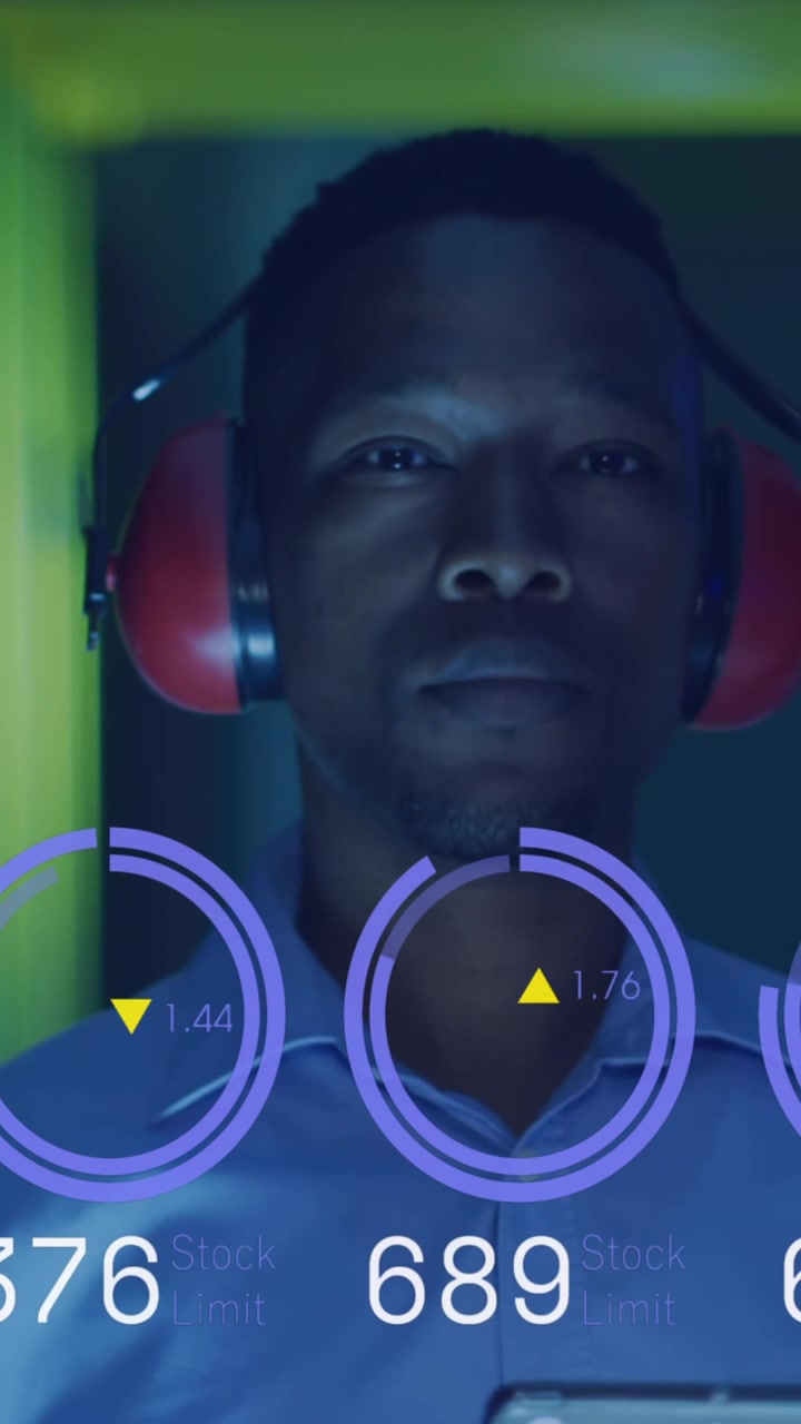 Animation of graphs and data over african american man in server room