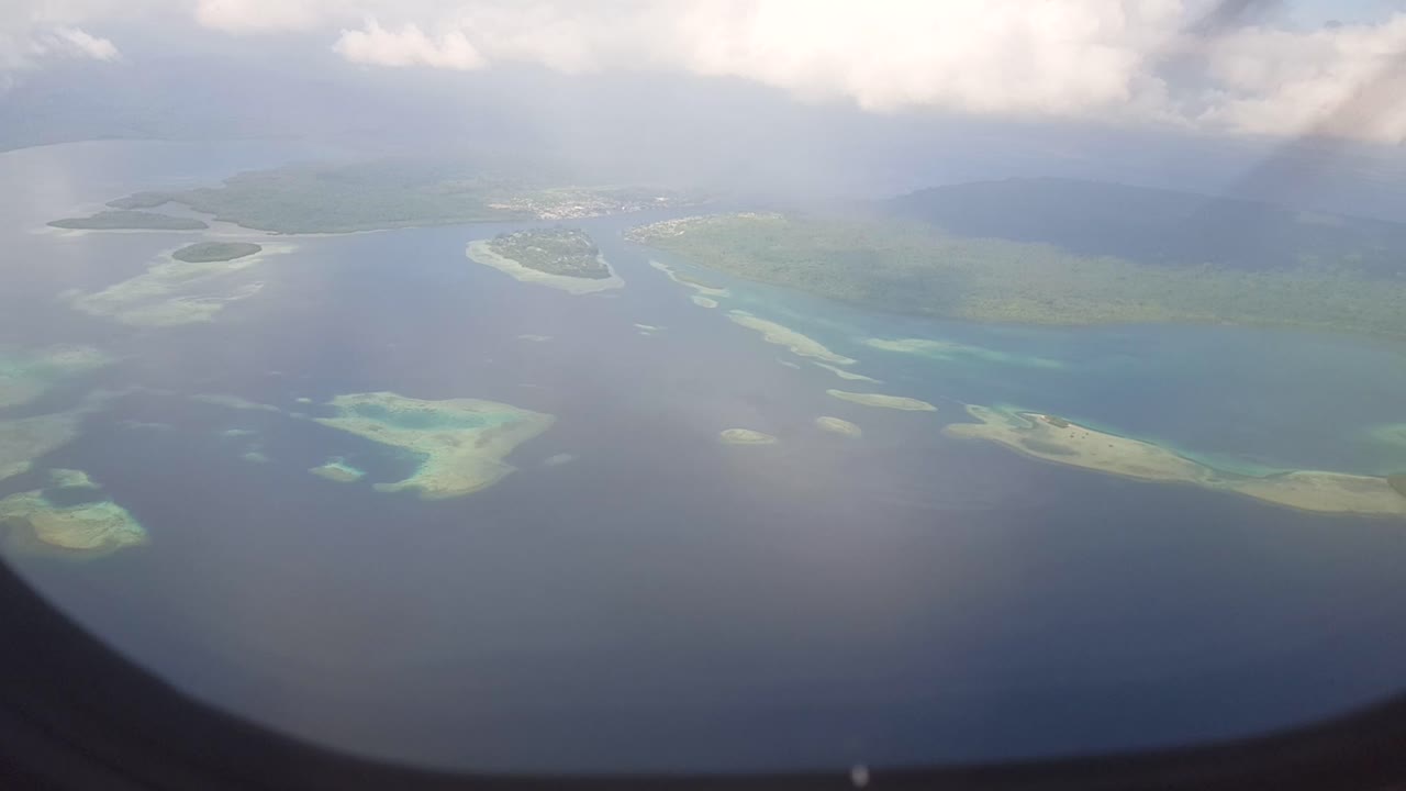 Aerial View of Tropical Islands and Coral Reefs