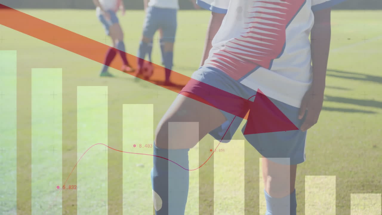 Soccer players on field with financial decline graph animation overlay