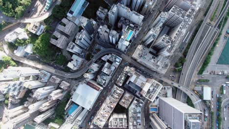 downtown hong kong city skyscrapers and urban traffic, aerial view