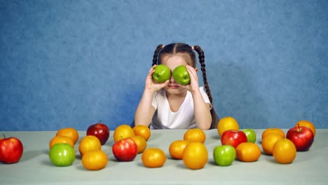 little girl with fruit. happy child girl and lot of fruit