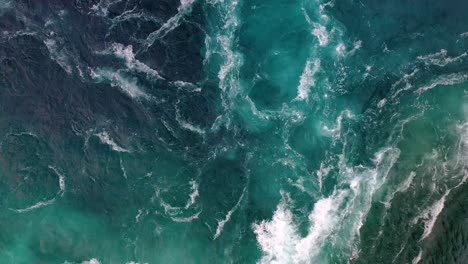 Waves-of-water-of-the-river-and-the-sea-meet-each-other-during-high-tide-and-low-tide.