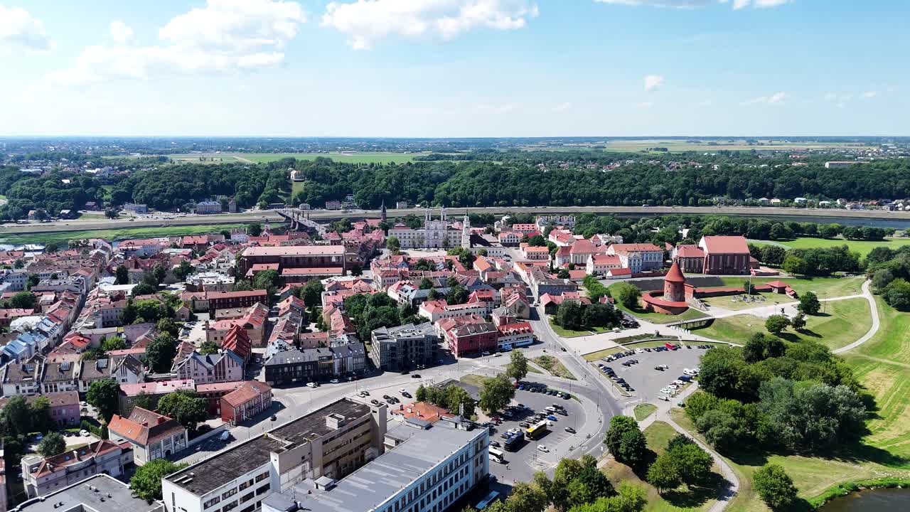 Red rooftops of Kauans old town and castle nearby, aerial view