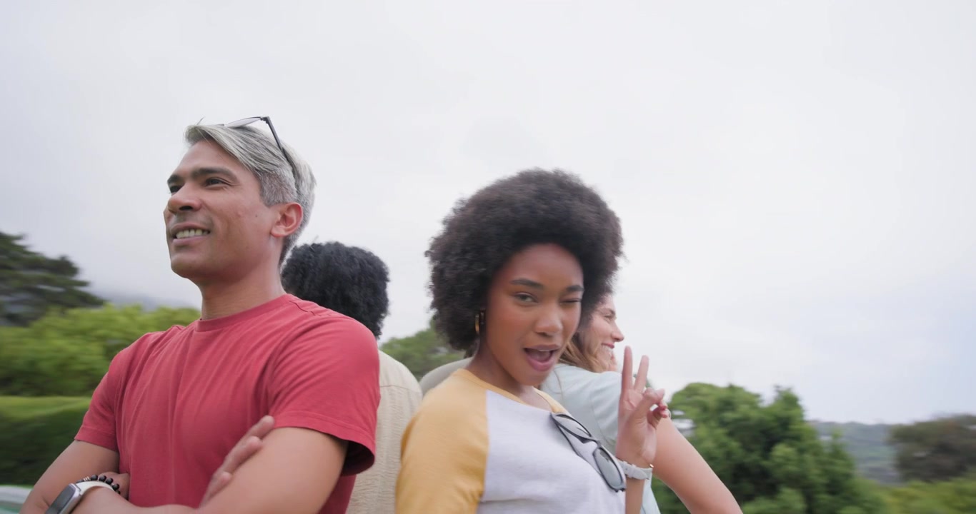 African American friends posing in backyard while camera circling, taking turns with sunglasses