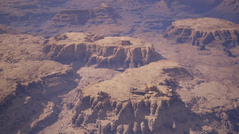 stunning aerial view of rugged mountains and distant canyons at midday