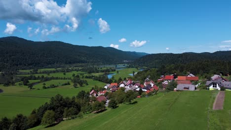 beautiful day at planisko pojle, small village, settlement in slovenia