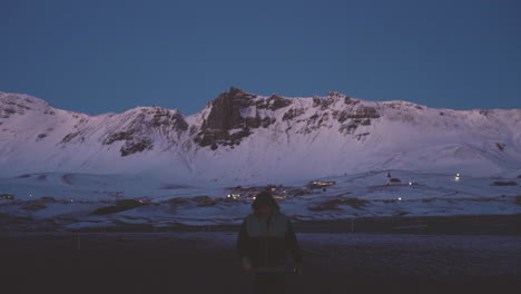 iceland tourist walking with background of snowy white landscape during winter season