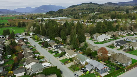 Roads-and-houses-of-a-small-suburban-neighborhood-tucked-in-the-mountains