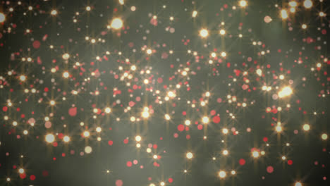 animación de manchas de navidad brillantes que caen sobre un fondo verde
