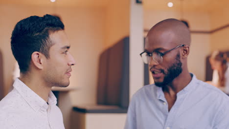 two young coworkers looking over paperwork