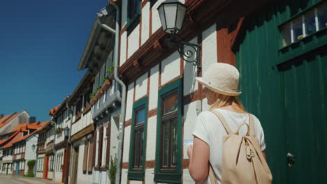 Tourist-With-Map-in-Old-German-Street