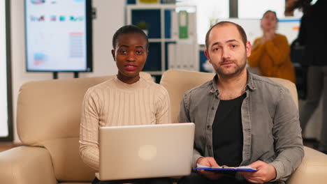 POV-of-Diverse-colleagues-discussing-about-financial-strategy-during-video-meeting