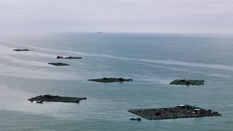 drone shot of vietnamese style fish farm