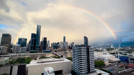 rainbow over brisbane city during 2022 floods