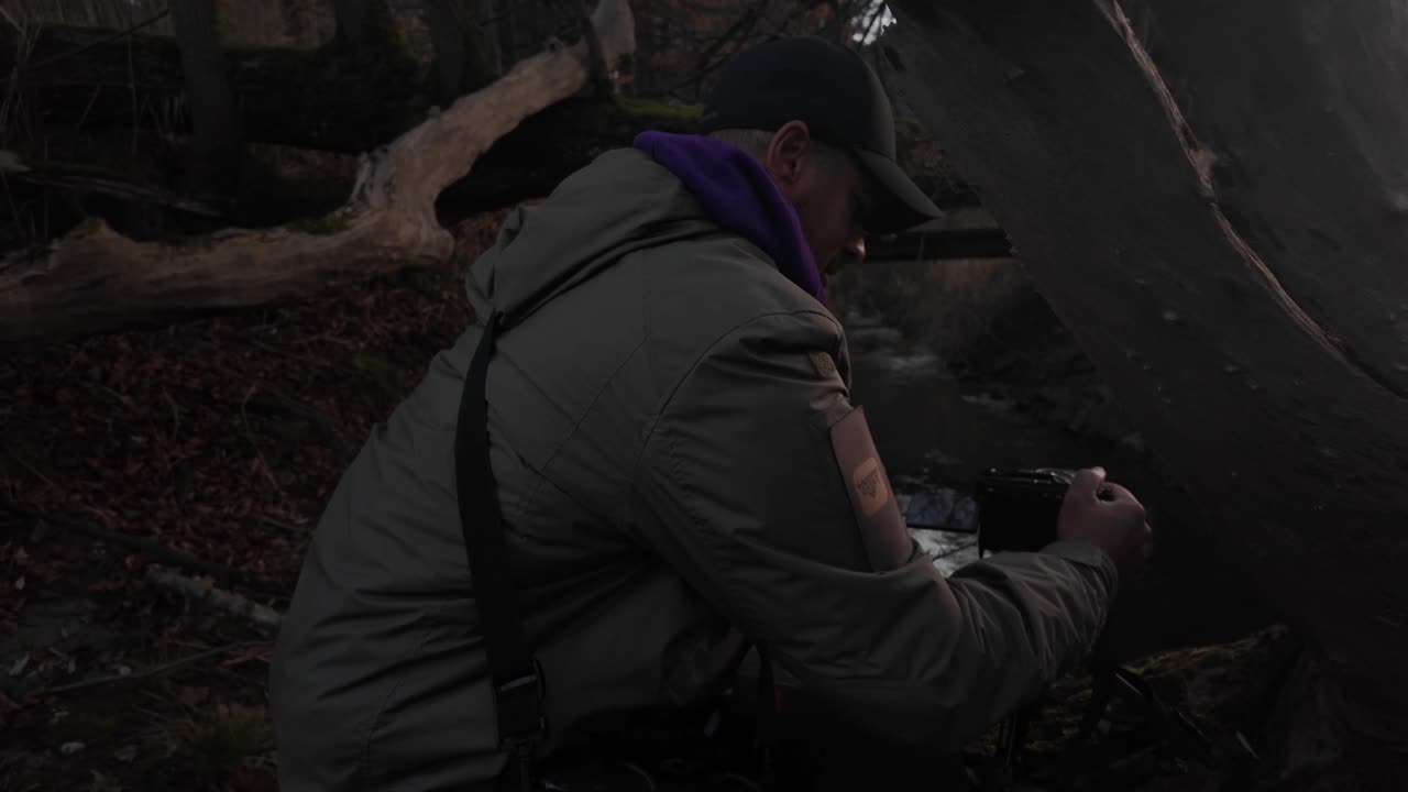 Nature videographer forest outdoor enjoy filming with mirrorless camera