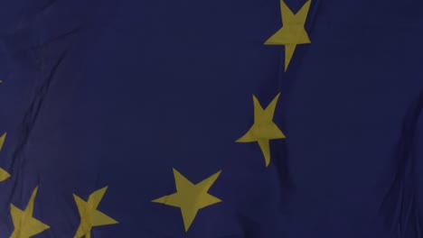 eu flag flying in wind in slo-mo close up