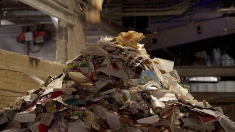 Recycling-paper-and-cardboard-are-falling-and-forming-a-stack