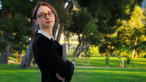 Attractive-caucasian-business-woman-looks-at-the-camera-with-an-expression-of-pride-and-confidence