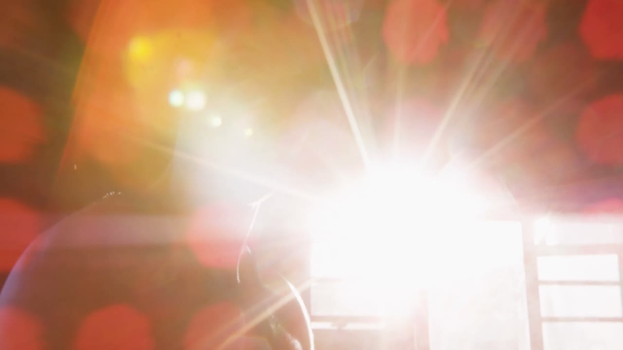 Man dusting his hands with chalk powder