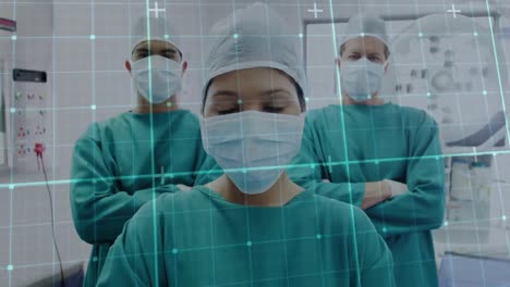 Animation-of-grid-network-over-portrait-of-team-of-surgeons-with-arms-crossed-in-operation-theatre
