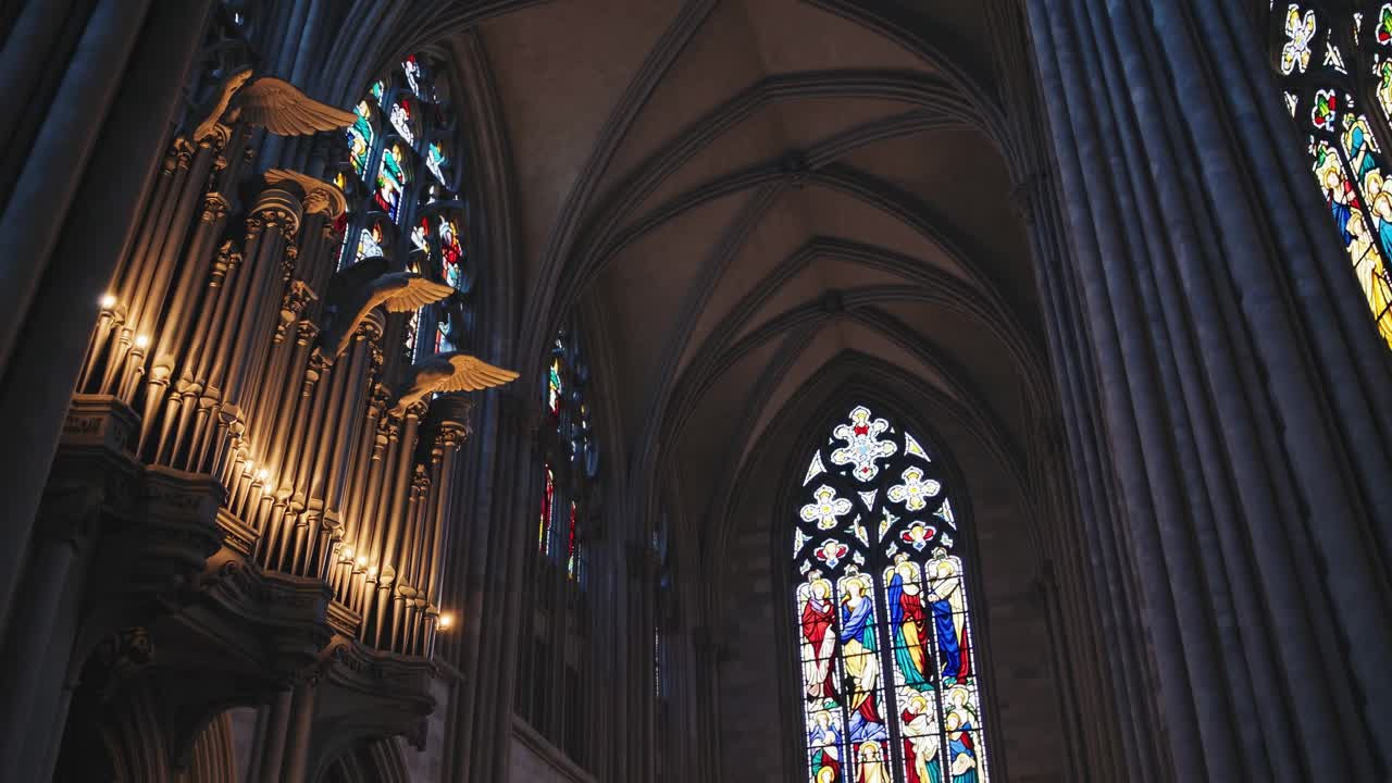 Gothic Cathedral Interior with Stained Glass and Organ