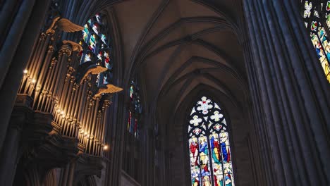 gothic cathedral interior with stained glass and organ