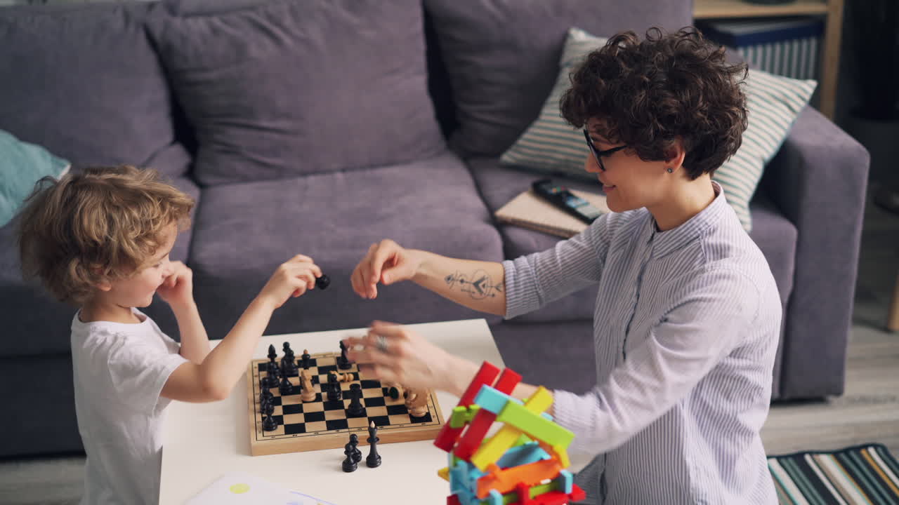 Mother and Child Playing Chess at Home