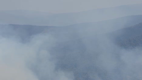 fire smoke above hills