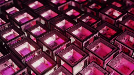 abstract background from metal cubes with random offset effect. the glass inside the cubes reflects light. seamless loop 3d render