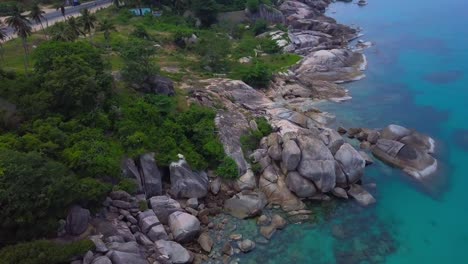 aerial flight above tropical island and the sea