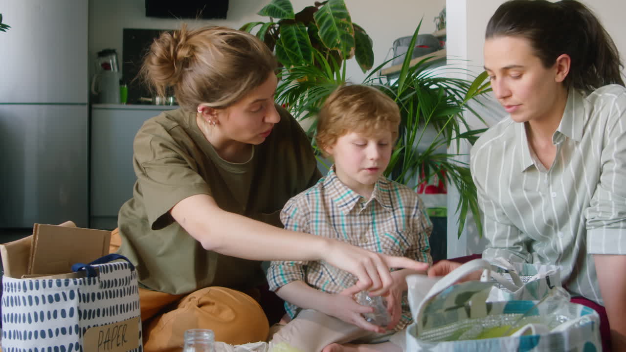 LGBTQ Family Sorting Waste at Home