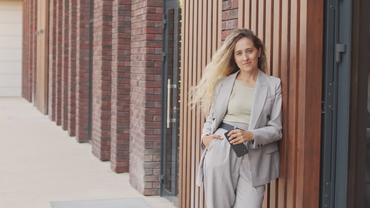 Portrait of Beautiful Blonde Business Lady Outdoors