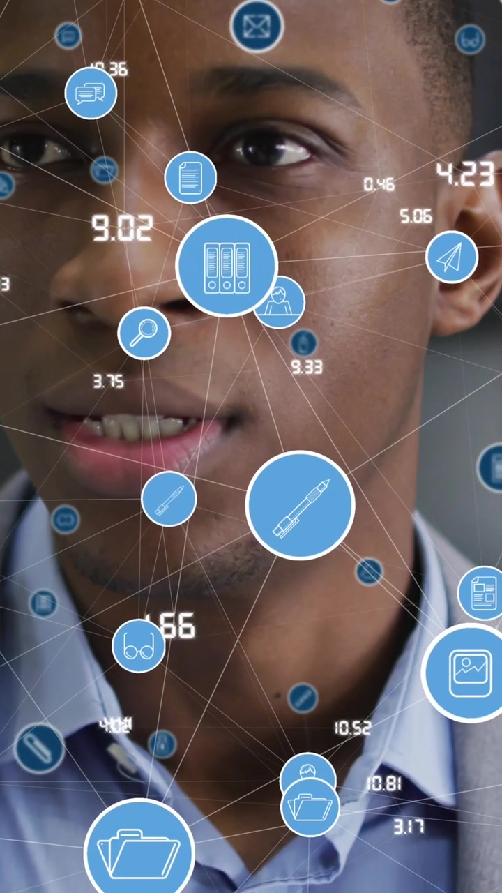 Animation of media icons over african american businessman in office