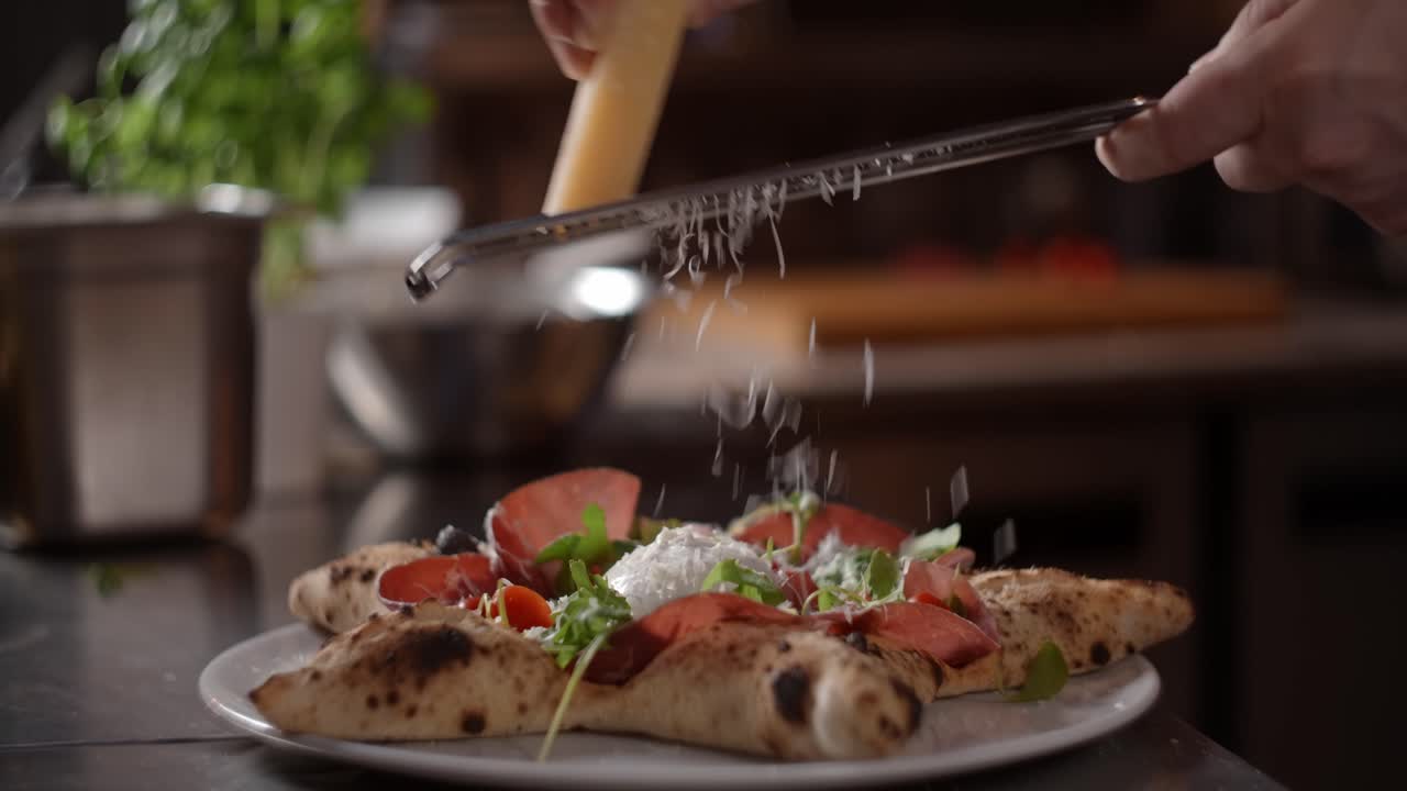 Chef preparing a star shaped pizza