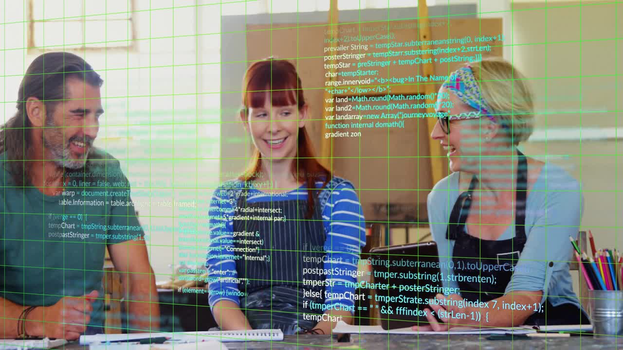 three colleagues collaborating in IT workshop around table with pencils integrating green code grid