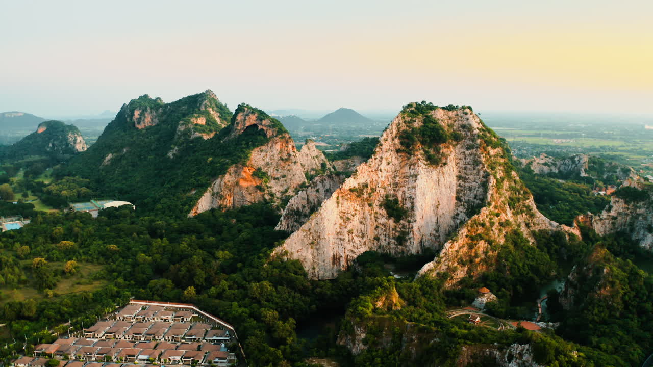 Scenic Mountain Range with Cityscape Below