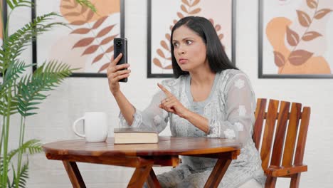 Angry-Indian-mother-talking-on-video-call