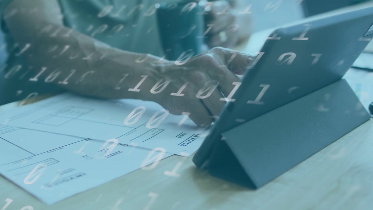 Engineer hand reaching, steadying tablet on folio, tapping and checking plans under binary overlay