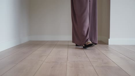 woman wearing black shoes and pants