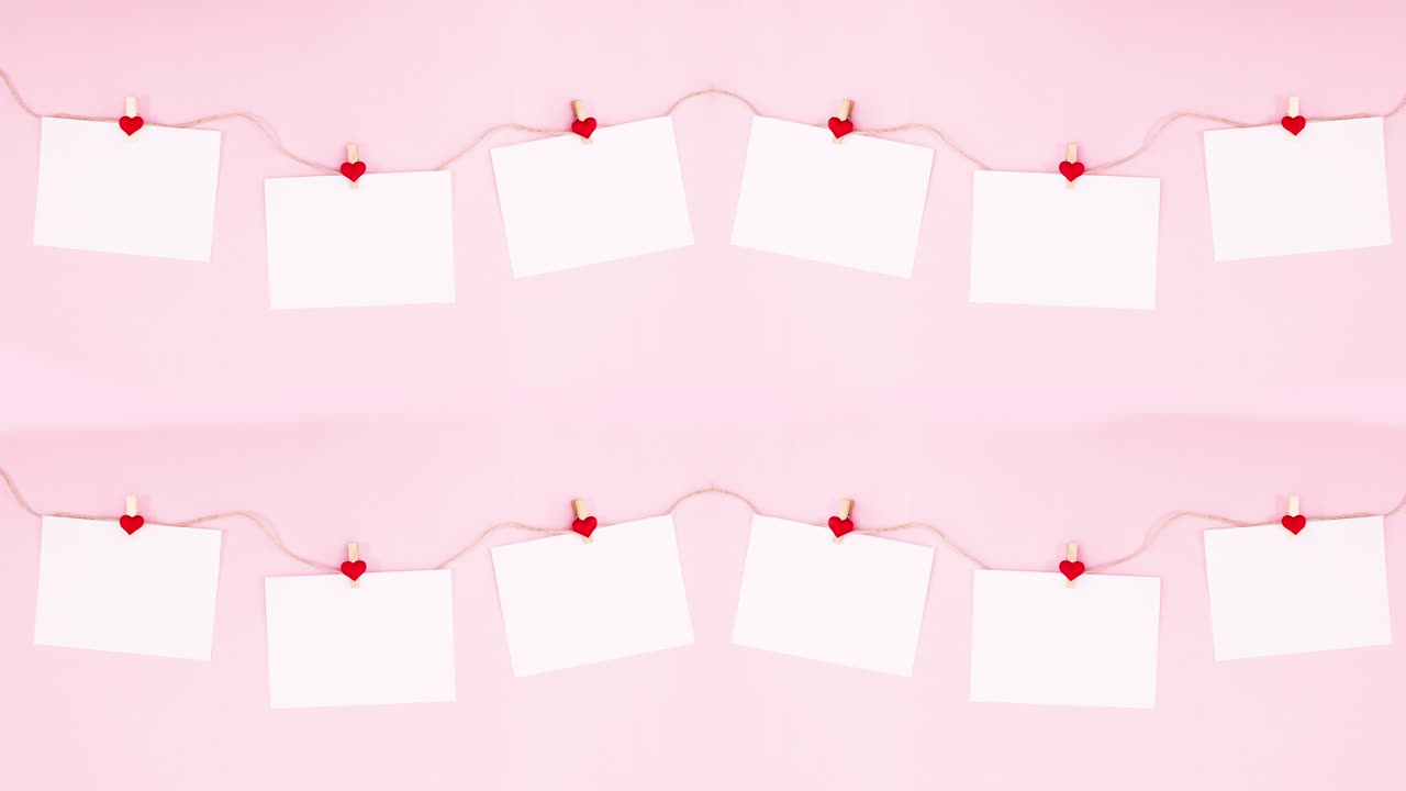 발렌타인 사랑의 마음은 종이에 인 로프에 매달려 있습니다. - 스 모션