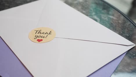 thank you sticker on envelope