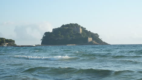 Fort-de-Bregancon-view-from-the-beach-mediterranean-sea-France-Bormes-mimosas