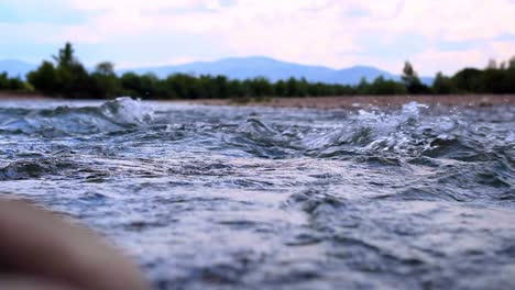 mountain river with rapid current. stormy mountain river. fast water stream