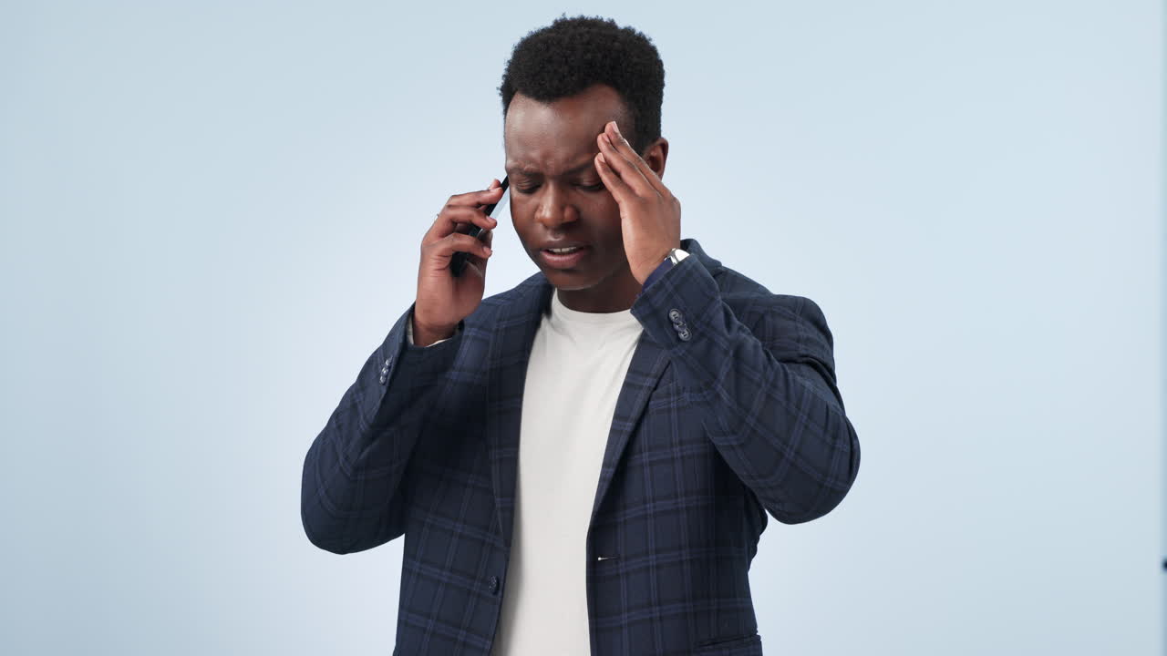 Frustrated, black man and phone call in stress