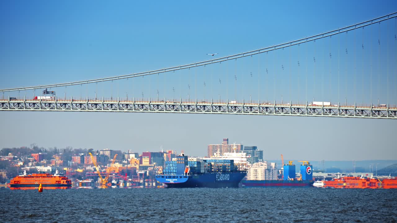 New York, USA, 24 December 2025: Harbor shipping near Verrazzano Narrows. Commercial ships operate near Verrazzano Narrows Bridge in New York