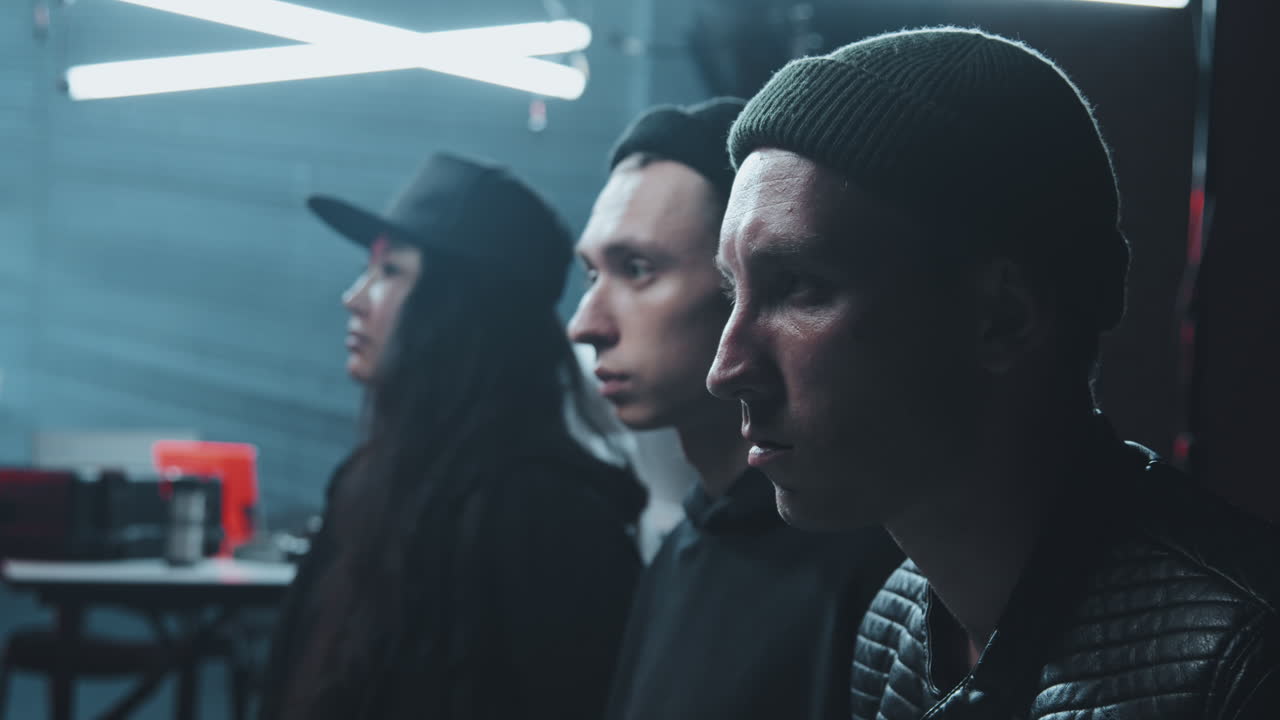 Arrested Criminal Hackers in Dark Hideout