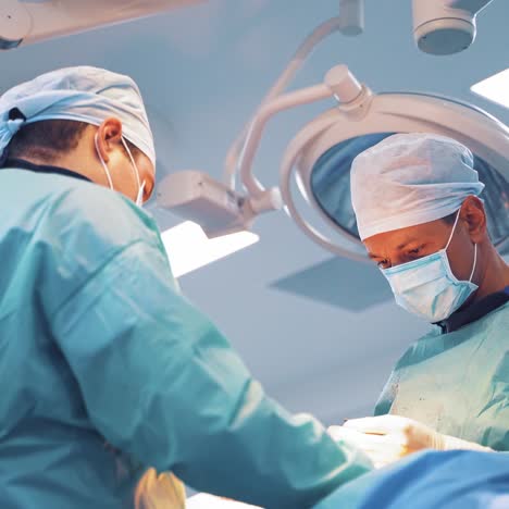 group of surgeon at work in operation theater
