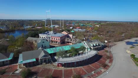 aerial shot over an abandoned and decaying theme park 1